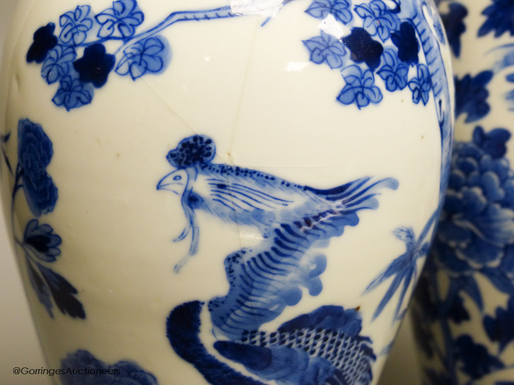 Two 19th century Chinese blue and white vases, decorated with phoenix, tallest 28cm (a.f)